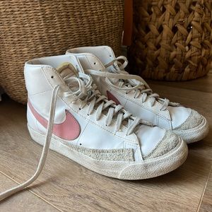 Pink and white Nike blazers